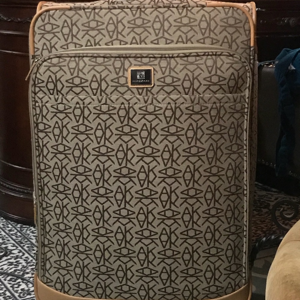 Large Anne Klein rolling luggage tote.